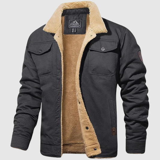 Blouson bomber chaud gris foncé doublé sherpa beige, col montant et poches poitrine.
