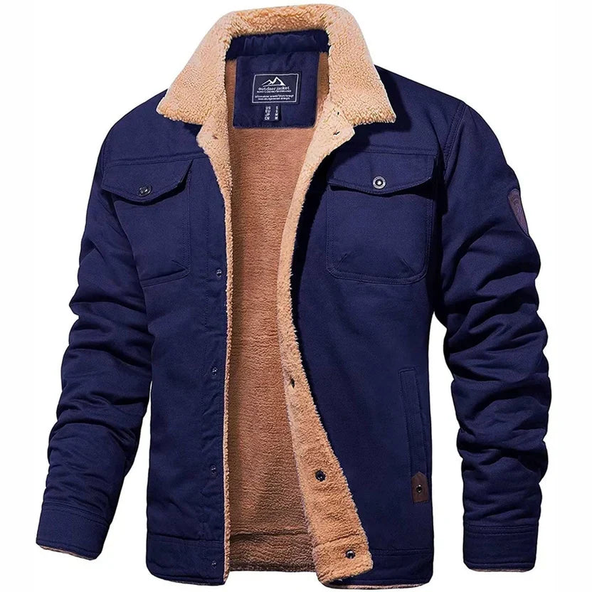 Blouson bomber chaud bleu marine doublé sherpa beige, col montant et poches poitrine.