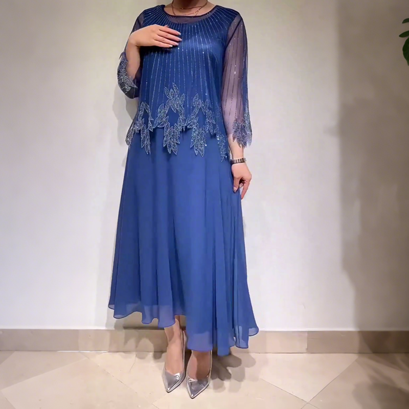Robe midi bleue à manches en voile, motif floral brodé et franges au buste
