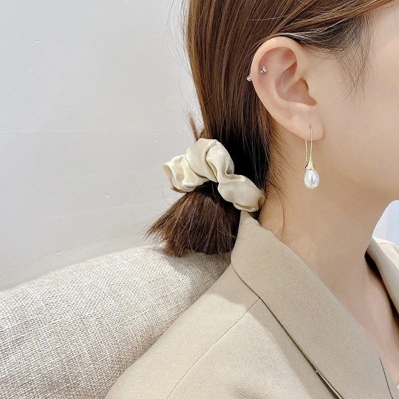 Boucles d'oreilles de beauté en perles classiques