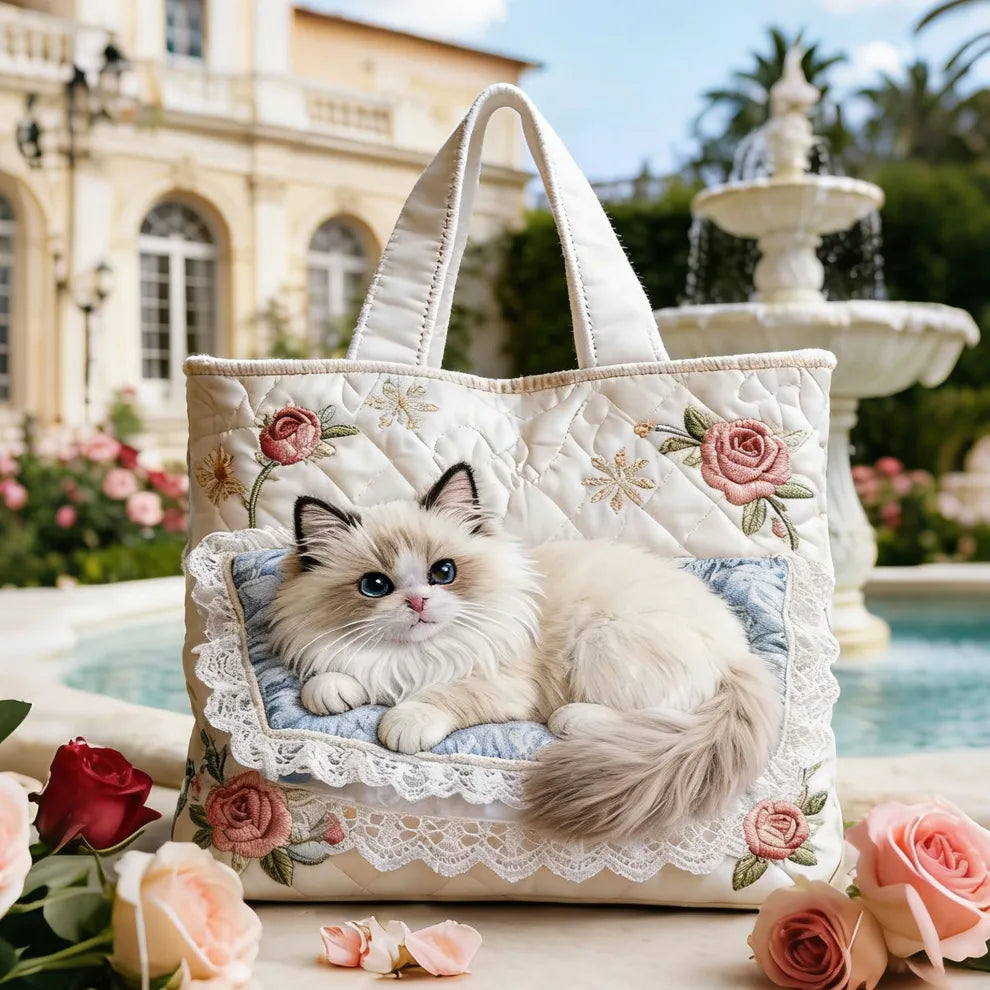 Sac à bandoulière en tissu clair, broderies de roses et appliqué avec chaton.