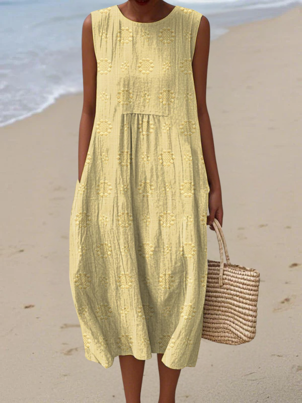 Robe midi jaune sans manches broderie florale, empiècements volantés
