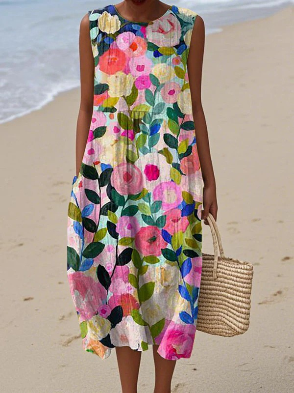 Robe midi sans manches à fleurs multicolores, encolure ronde, coupe ample.