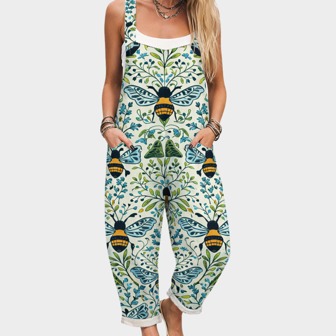 Salopette verte sans manches à bretelles, motif abeilles et fleurs, poches, jambes 3/4.