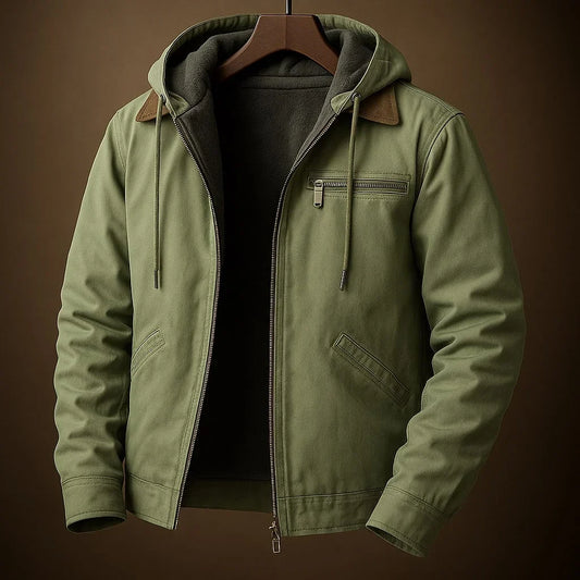 Veste à capuche vert zippée, poche zippée poitrine et cordons à la capuche.
