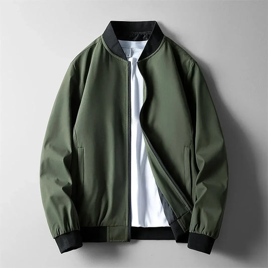 Blouson bomber coupe-vent vert, fermeture zippée, col montant, poignets côtelés