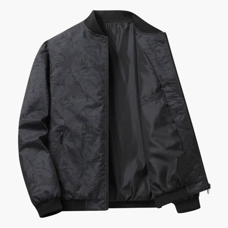 Blouson bomber Louis gris foncé à motif discret, fermeture zippée et pochette zippée.