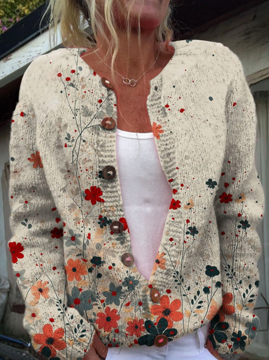 Cardigan vintage en maille écrue à fleurs, boutons sur le devant, encolure en V.
