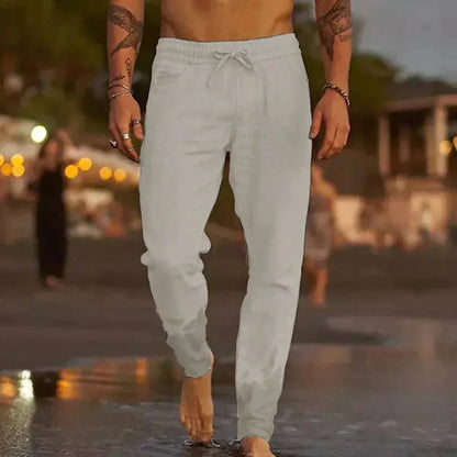 Pantalon en lin de plage blanc, taille élastique avec cordon, coupe ajustée aux chevilles
