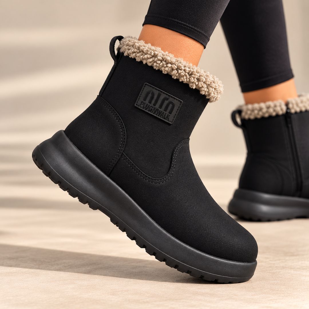 Maja bottines teddy portées avec un jean