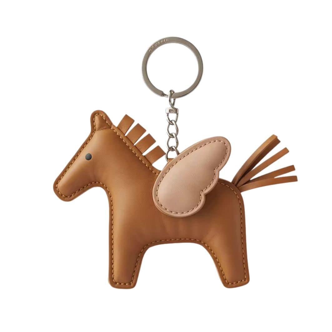 Porte-bonheur cheval en cuir marron avec porte-clés, détails beige et glands