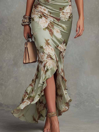 Robe longue satin vert à ourlet asymétrique avec volants, imprimé fleurs claires.