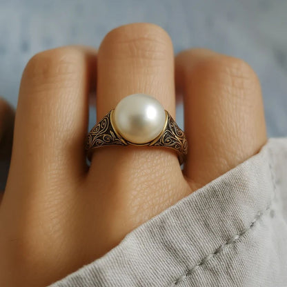 Bague intemporelle vintage perle or