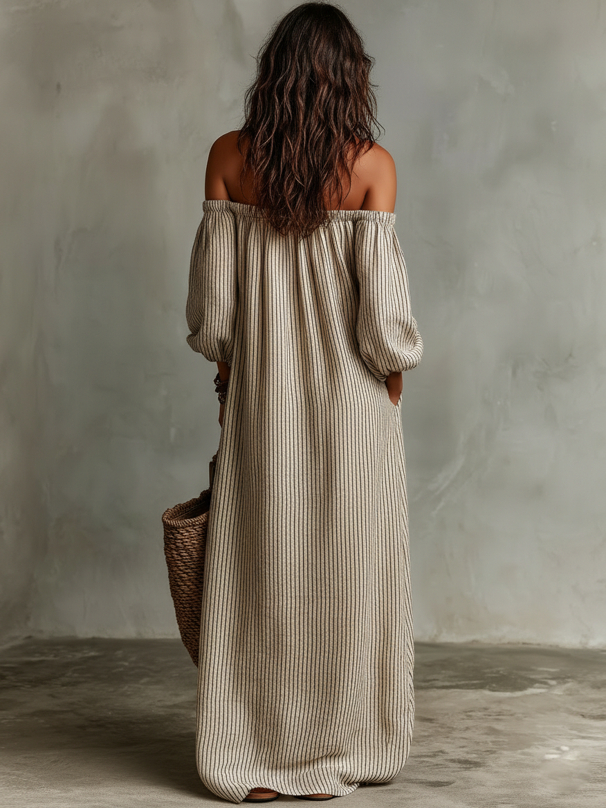 Robe longue à rayures verticales beige, épaules dénudées et dos dégagé, manches bouffantes.
