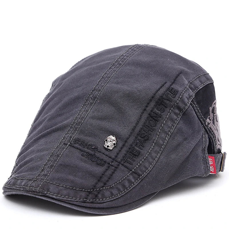 Casquette d’été Bloom™ gris foncé, vue de côté avec coutures et logo central.