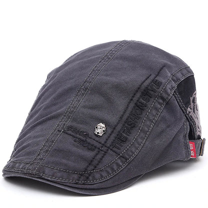 Casquette d’été Bloom™ gris foncé, vue de côté avec coutures et logo central.