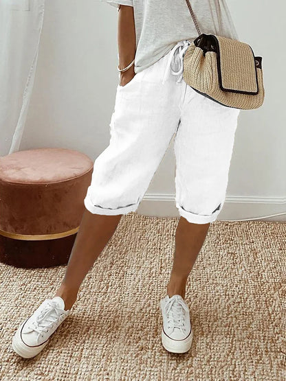 Pantalon 3/4 en lin coton blanc, taille à cordon, poches, jambes retroussées