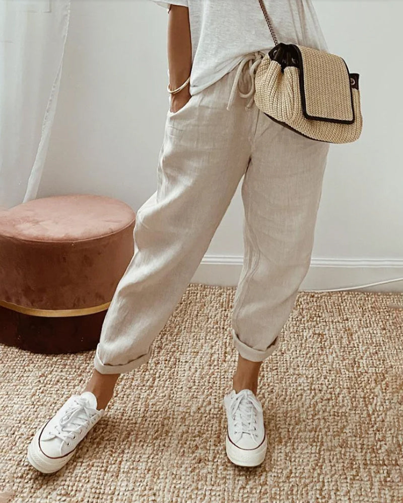 Pantalon fluide beige clair, taille élastique, jambes amples jusqu’aux chevilles