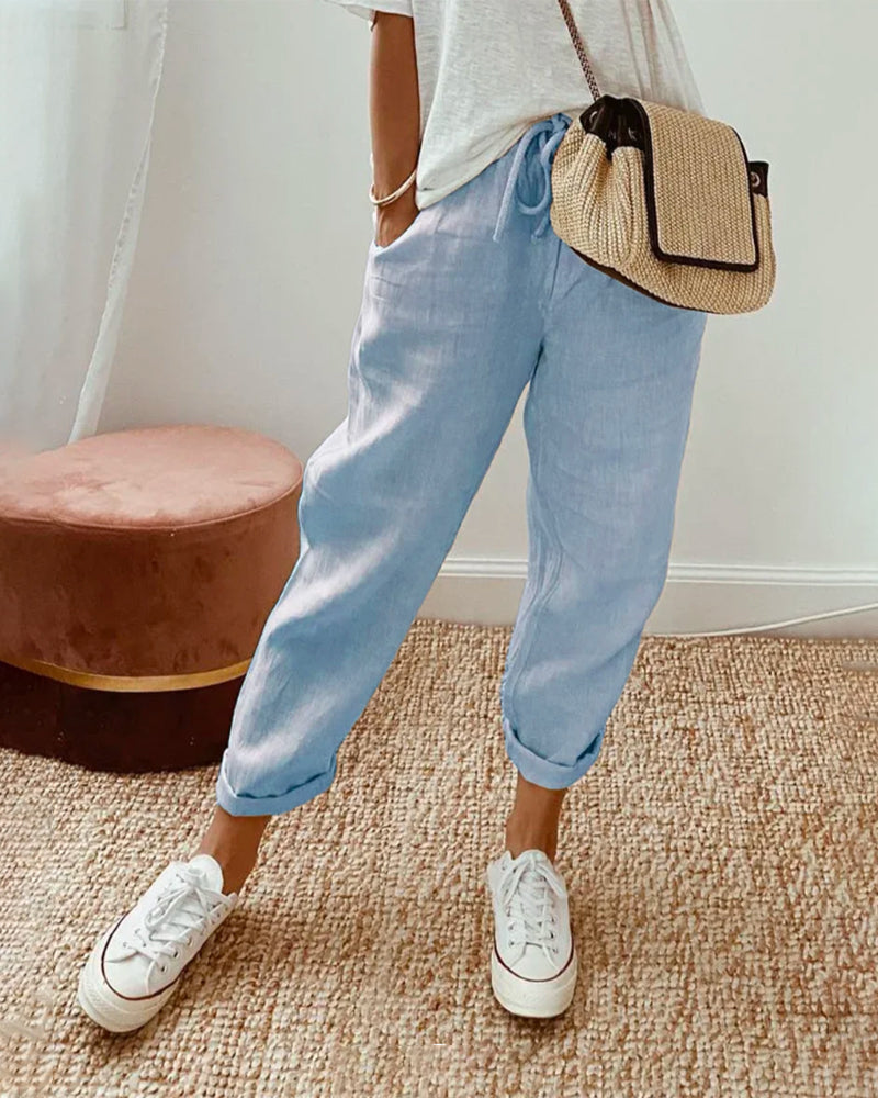 Pantalon fluide bleu clair, taille élastique, jambes amples jusqu’aux chevilles