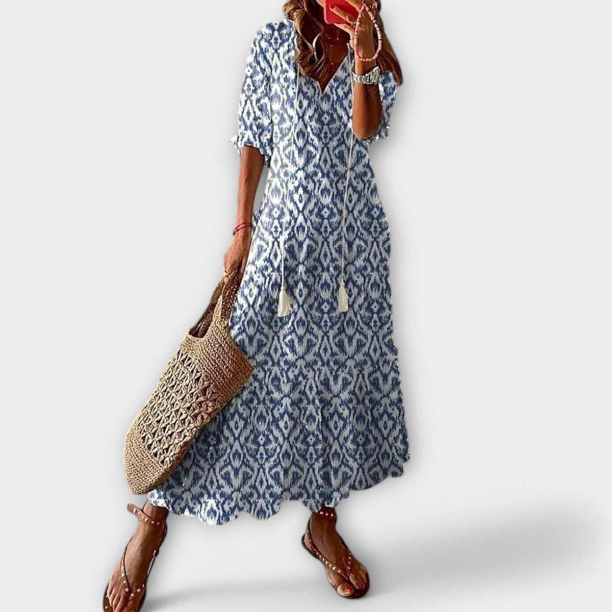 Robe longue ample bleue à motifs, manches courtes, coupe évasée