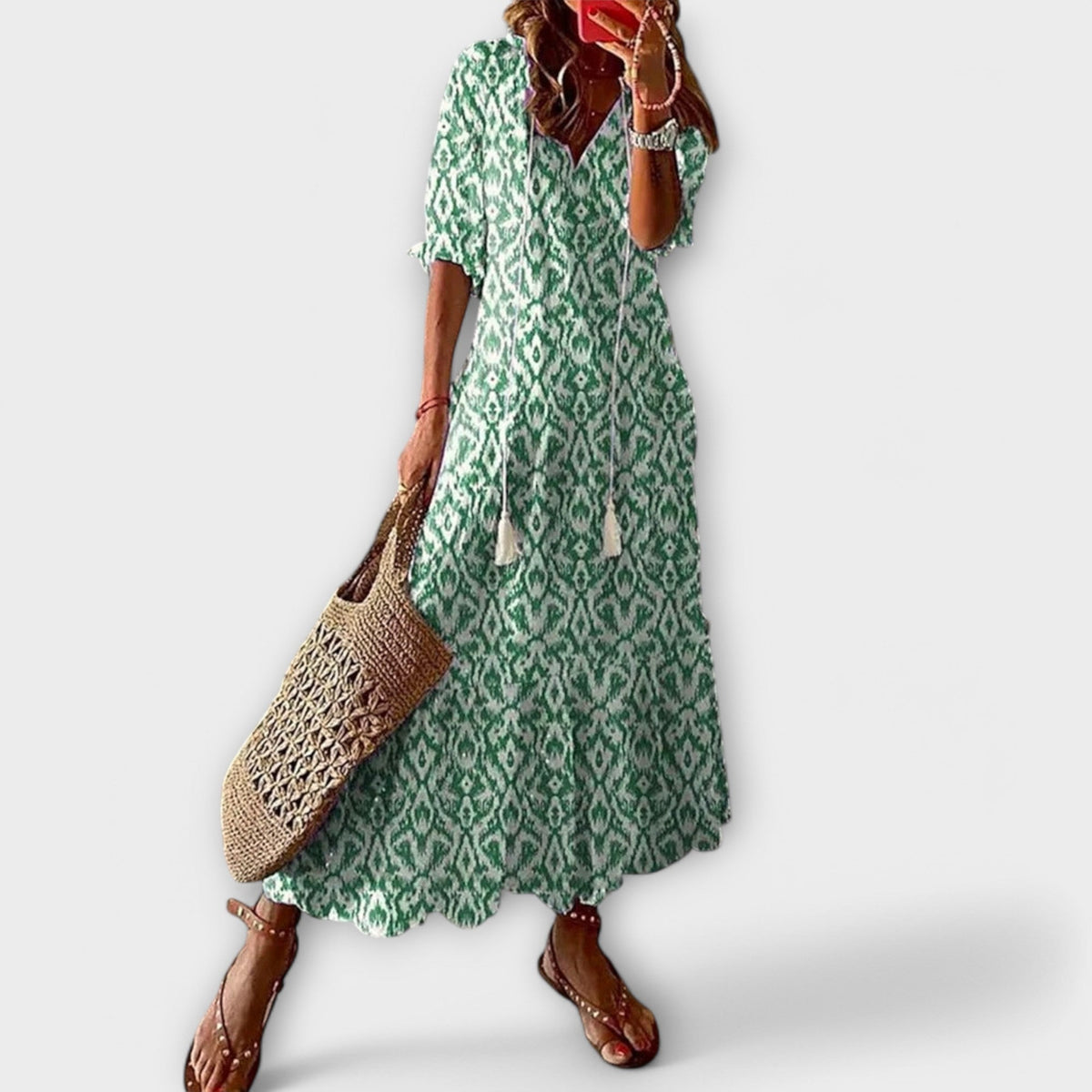 Robe longue ample verte à motifs, manches courtes, ourlet évasé