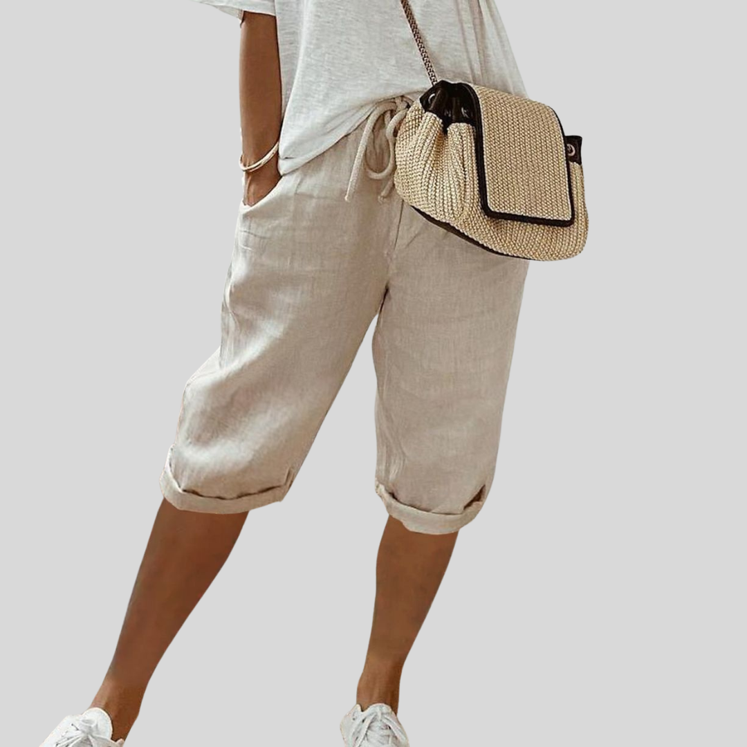 Short fluide beige à taille élastique et cordon, bas retroussé, mi-cuisse