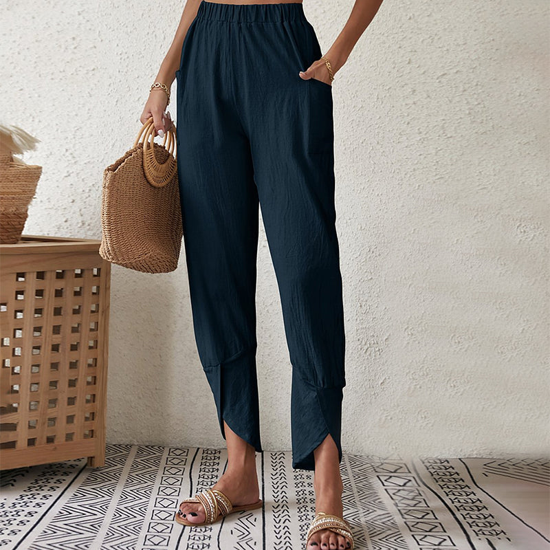 Pantalon fluide bleu marine à taille élastique, ourlet effiloché