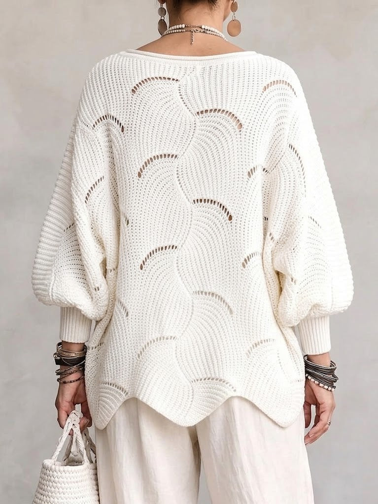 Haut en tricot blanc à manches lanternes amples et motif vagues creuses