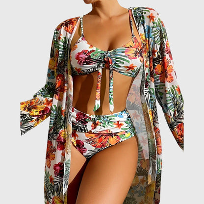 Bikini fleuri avec paréo transparent noué, haut bandeau à lien central