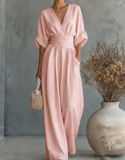 Combinaison rose clair décolleté V, ceinture, jambes larges, manches larges