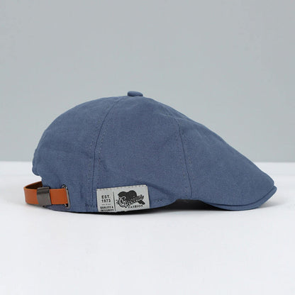 Casquette classique Bloom™ bleu avec bouton sur le dessus et étiquette frontale.