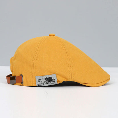 Casquette classique Bloom™ jaune avec sangle brun orangé et étiquette au front.