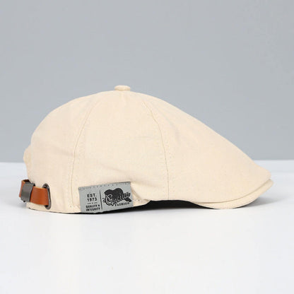Casquette classique Bloom™ écru avec sangle brun gris et étiquette frontale.