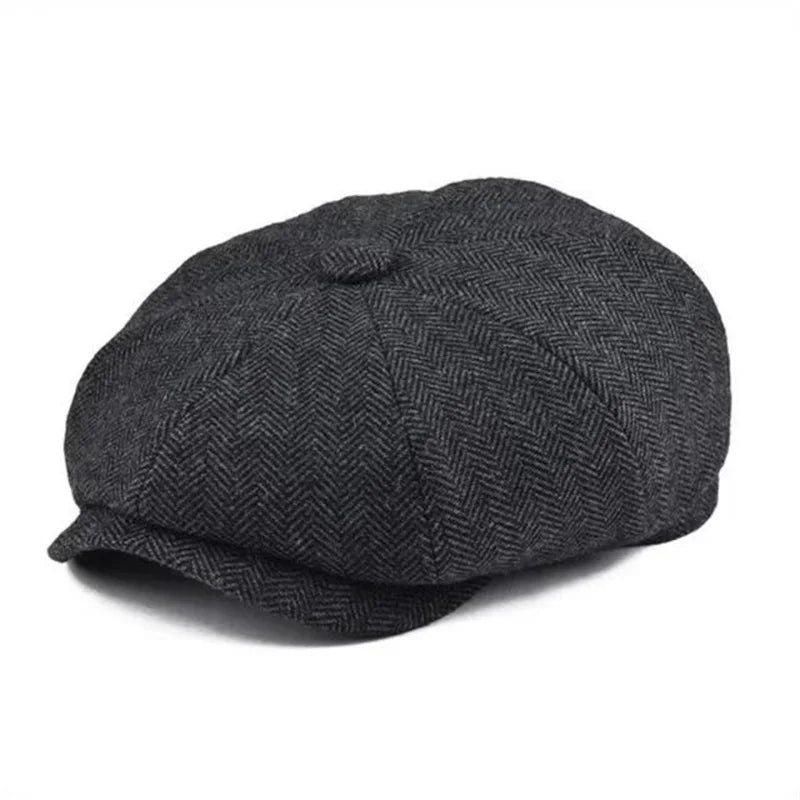 Bonnet d’hiver Bloom™ gris anthracite à motif chevrons, visière courte, bouton.