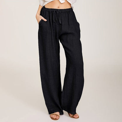 Pantalon ample noir, taille élastique froncée et cordon de serrage