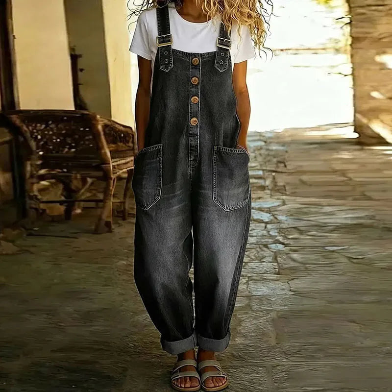 Salopette en jean noir, bretelles réglables, boutons devant, poches