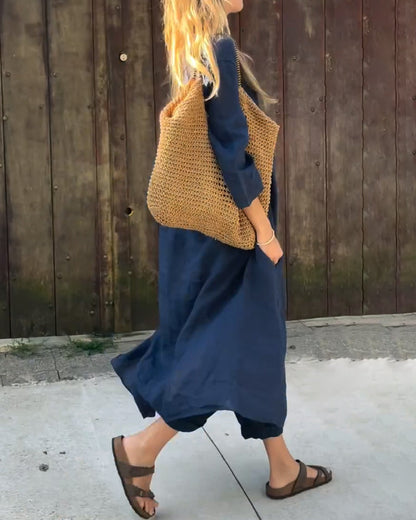 Ensemble tunique ample et pantalon fluide en bleu marine, drapé léger et manches 3/4
