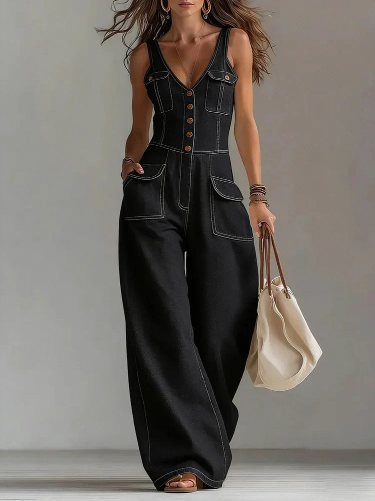 Combinaison en jean ample noire, bretelles, encolure V, boutons devant et poches