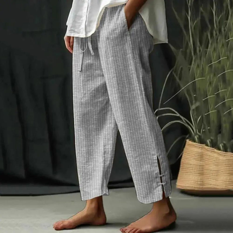 Pantalon bleu clair texturé, taille à cordon et jambes larges longueur cheville