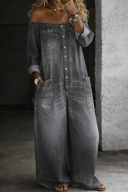 Combinaison en jean gris délavé à épaules dénudées, manches longues boutonnées, poches