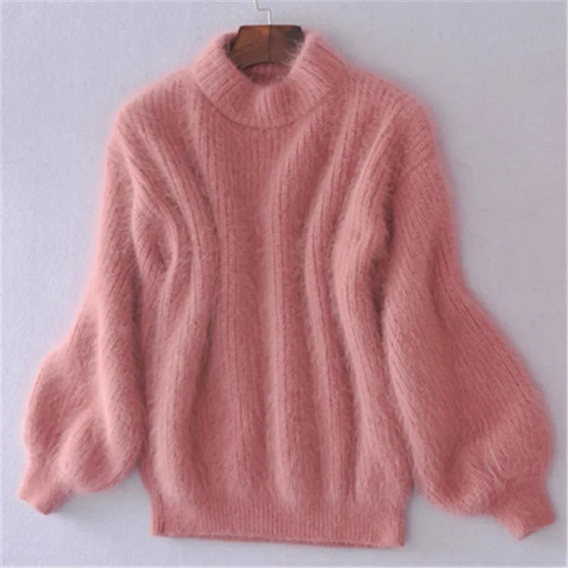 Pull col roulé rose en maille côtelée, manches longues bouffantes, coupe ample