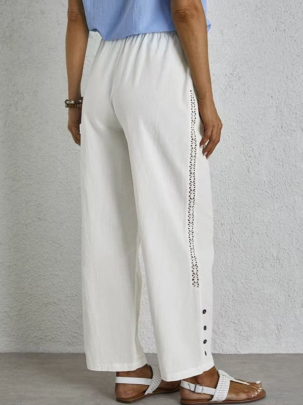 Pantalon ample blanc cassé avec taille élastique, cordon et boutons décoratifs