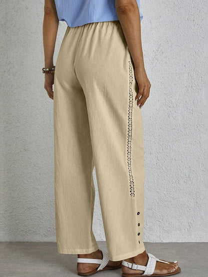 Pantalon ample kaki avec taille élastique, cordon et boutons décoratifs sur le côté