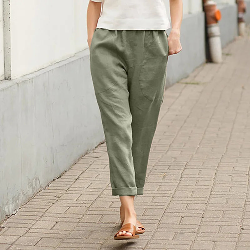Pantalon ample vert avec poches, taille élastique, bas légèrement resserré