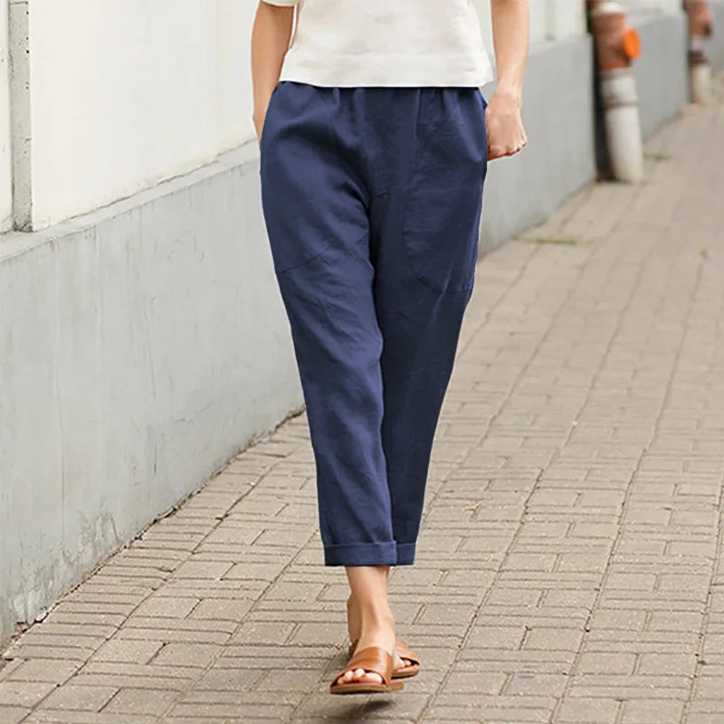 Pantalon ample bleu marine avec poches, taille élastique, cheville resserrée