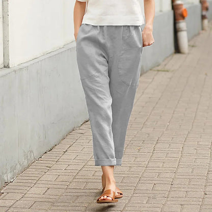 Pantalon ample gris avec poches, taille élastique, cheville resserrée