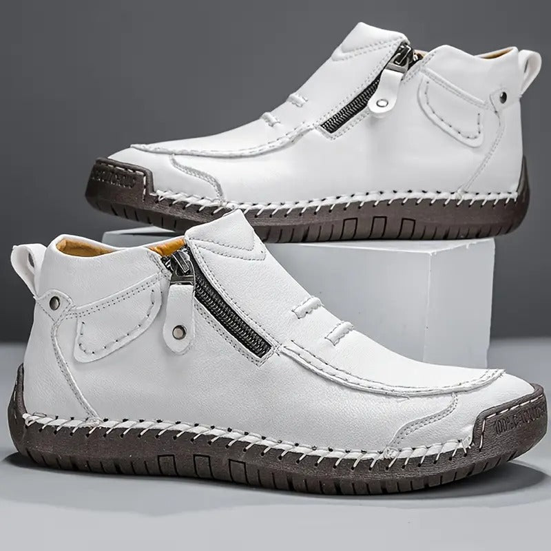 Chaussures montantes blanches en cuir, fermeture éclair latérale et semelle épaisse