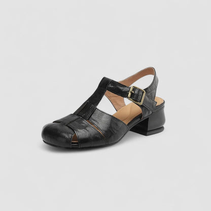 Chaussures bébé noires style rétro, brides à boucle et talon carré bas