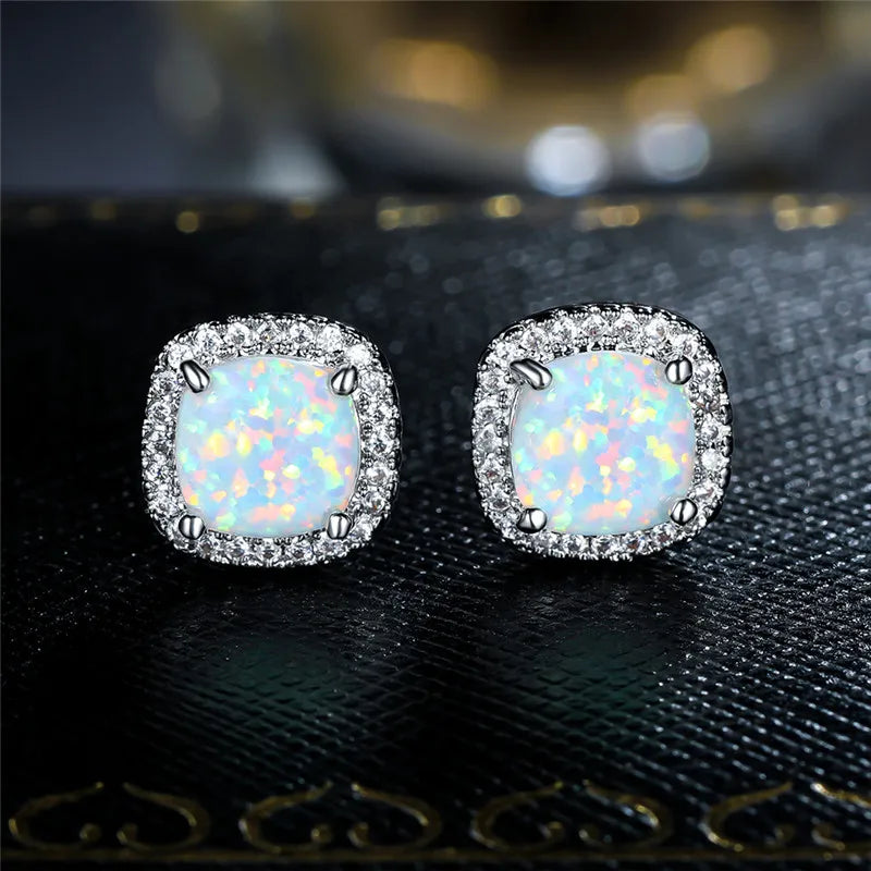 Boucles d’oreilles argent, opale de feu aux reflets arc‑en‑ciel, monture pavée