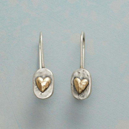 Boucles d’oreilles ovales argentées, cœur doré incrusté, attache fine